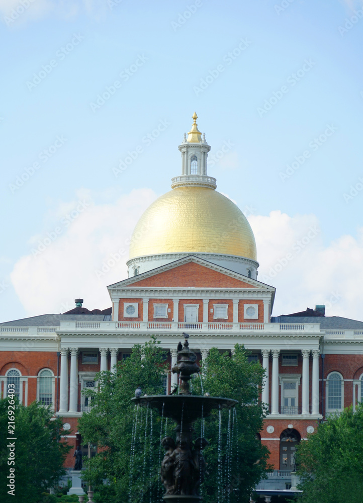  facade view of MA state house in sunny day