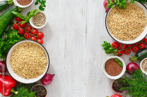 Green buckwheat vegetables cooking raw food copy space top view photo