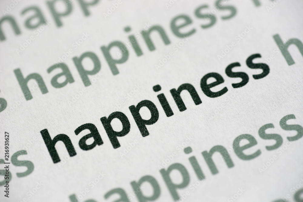word happiness printed on paper macro word happiness printed on paper macro