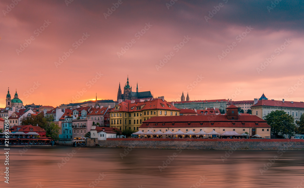 Stunning cityscape of Prague on a sunset in Czech Republic. Vltava river, Prazsky hrad (Prague castle).