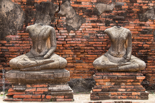 Ruin ancient buddha statues damaged in wat chaiwatthanaram at ayutthaya historical park Thailand