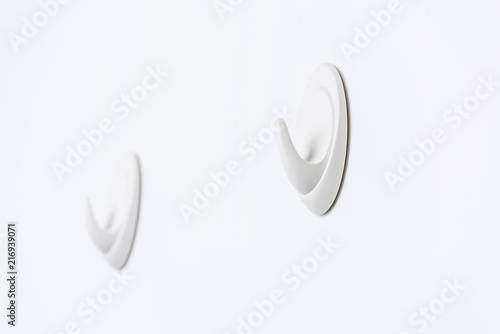 Wall hooks on white background. photo