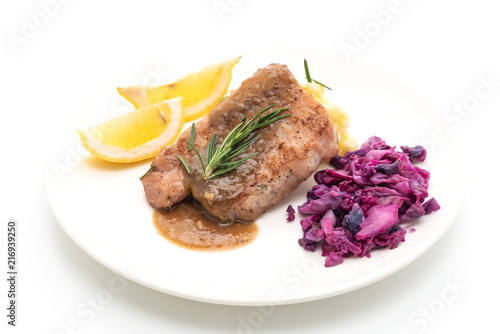 pork steak with red cabbage and mashed potatoes