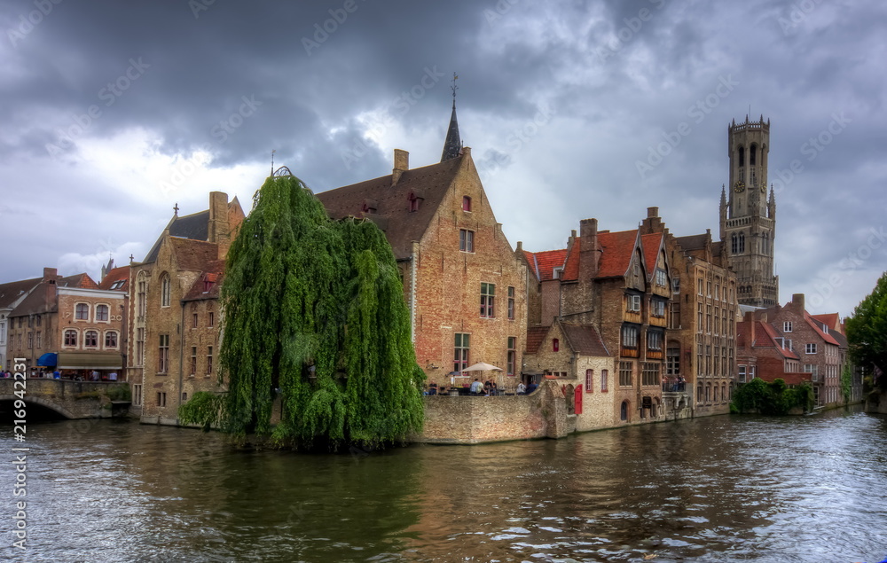 Rozenhoedkaai canal and Belfort tower, Bruges, Belgium