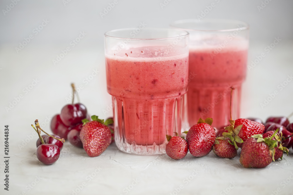Red berries smoothies with strawberries and cherries fruits Red berries smoothies with strawberries and cherries fruits