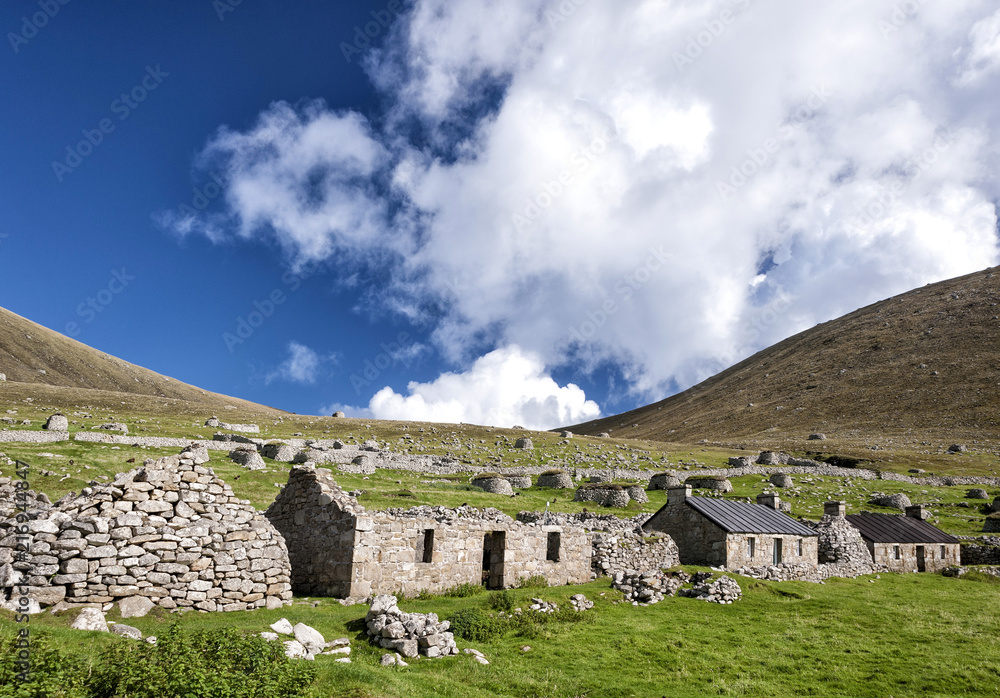 A view of Main Street, Village Bay, St. Kilda, showing both the ancient and newer blackhouses