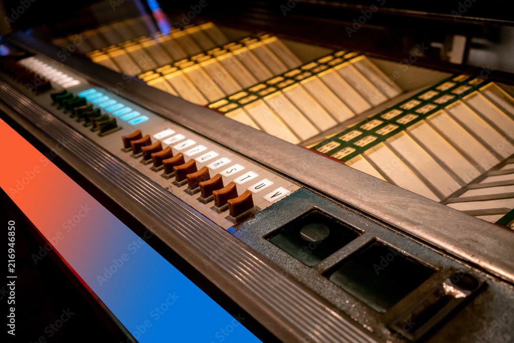 Retro styled image of an old jukebox with empty labels Retro styled image of an old jukebox with empty labels