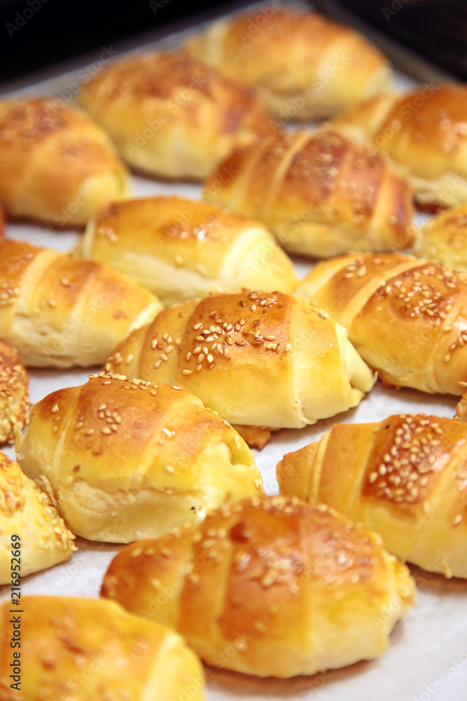 baked rolls / Baked rolls bread with cheese on a white background