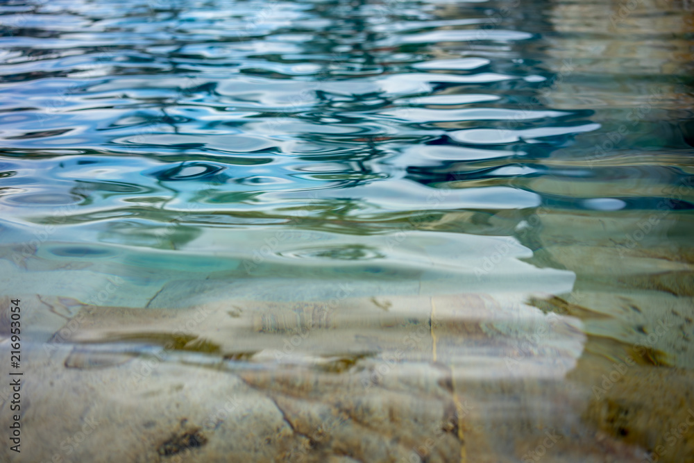 Swimming pool, close up, ripple water effect Swimming pool, close up, ripple water effect