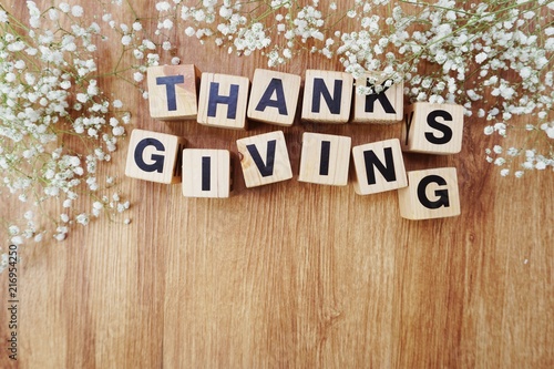 thankgivings alphabet letters on wooden background