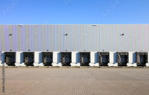 Large warehouse exterior with gates for dispatching goods