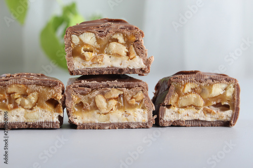 chocolate candy bar with peanuts and nougat