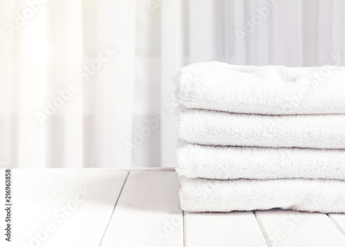 Clean white towels in stack
