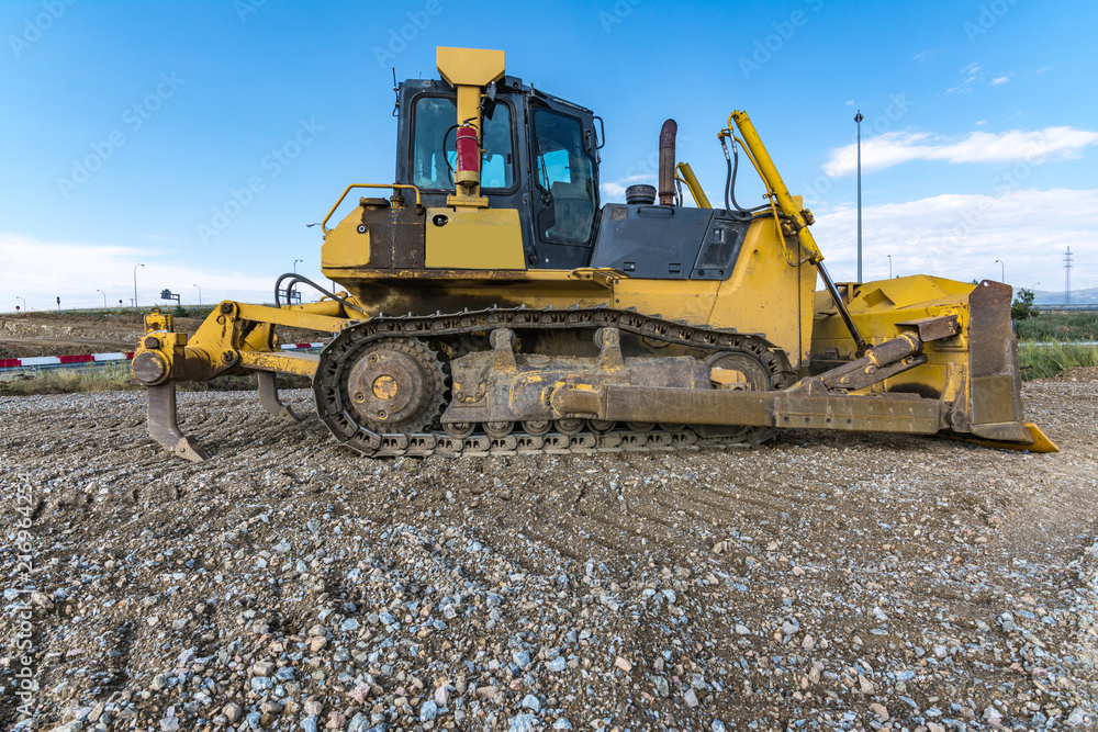 Excavator performing earthworks work in the expansion works of the Madrid-Segovia-Valladolid highway Excavator performing earthworks work in the expansion works of the Madrid-Segovia-Valladolid highway
