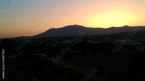 Wallpaper Mural Descending at sunset with beautiful orange, red and blue sunset over the mountains in Southern Europe during summer. Torontodigital.ca