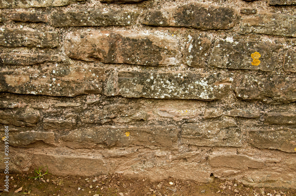 Old stone wall in the countryside. Old stone wall in the countryside.