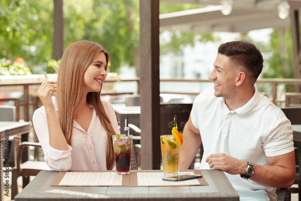 Two people in cafe enjoying the time spending with each other Two people in cafe enjoying the time spending with each other