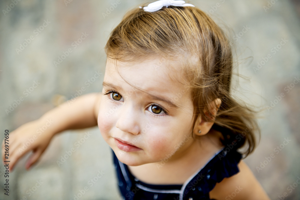 two years old child girl on urban street two years old child girl on urban street