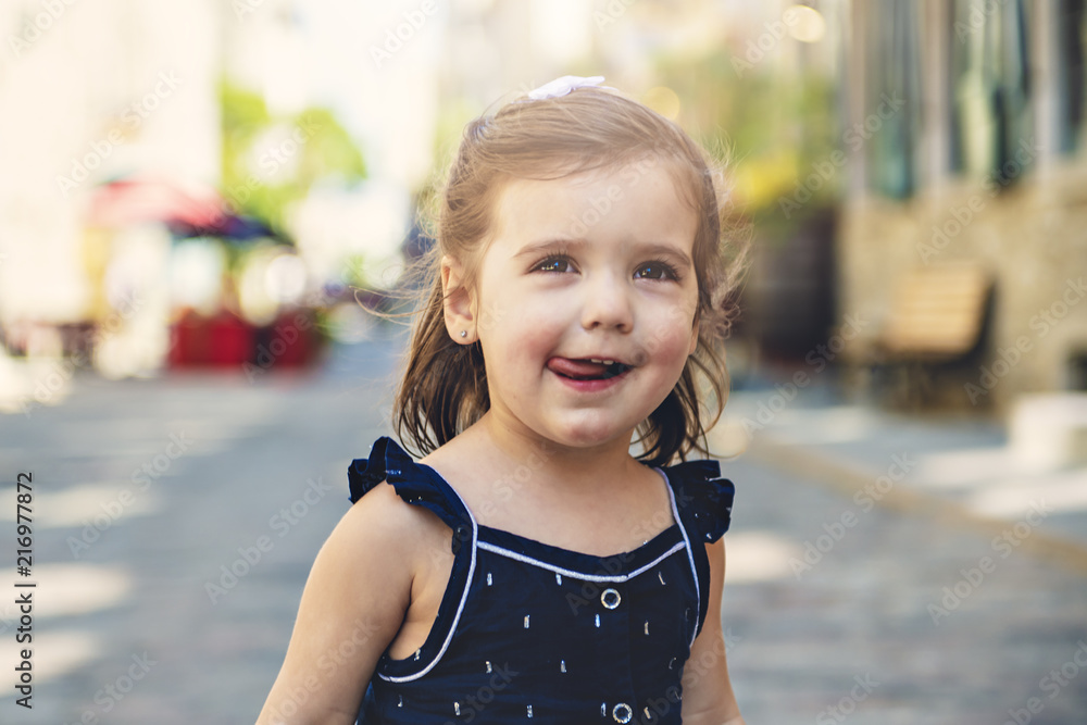 two years old child girl on urban street two years old child girl on urban street