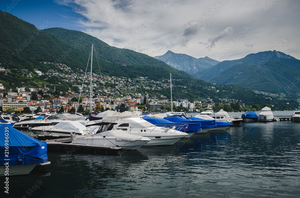 Boats on a lake in a pier in Locarno