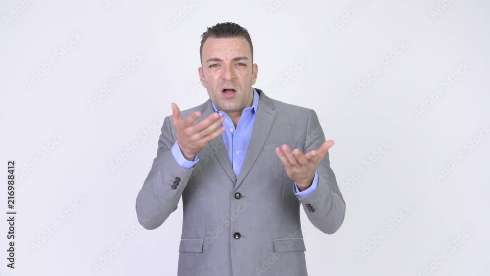 Shocked And Surprised Businessman Shrugging Shoulders Shocked And Surprised Businessman Shrugging Shoulders