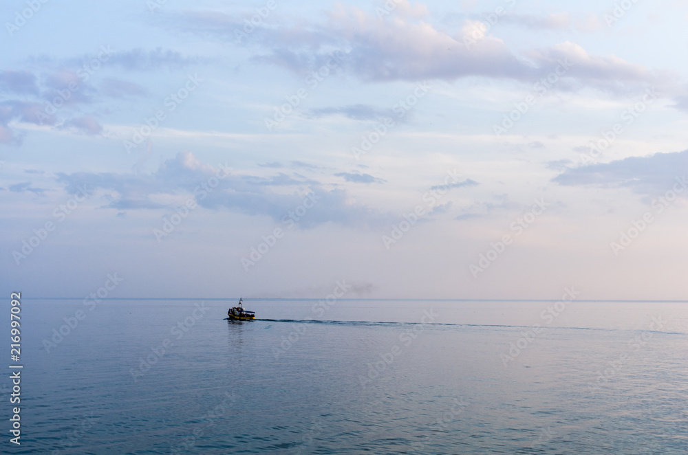 Naklejka premium Ship silhouettes in the Baltic sea during a beautiful sunset