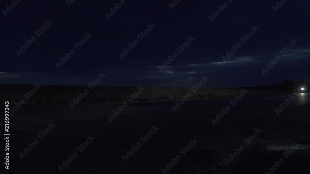 Bikers riding on the night road on motorcycle Bikers riding on the night road on motorcycle