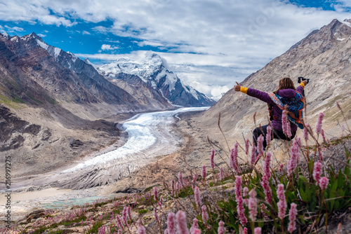Beautiful landscape of D rang-Drung Glacier with flowers, Mountain glacier on zanskar road at Himalaya Range, Zanskar, Jammu and Kashmir. photo