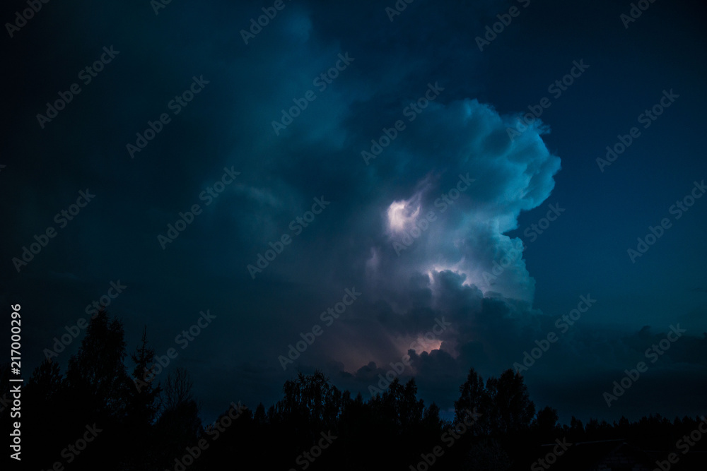 Thunderstorm Clouds with Lightning at the evening