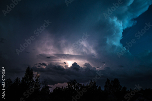 Thunderstorm Clouds with Lightning at the evening