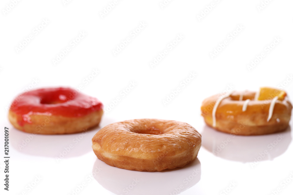 Chocolate strawberry and orange Donut isolated on white background Chocolate strawberry and orange Donut isolated on white background