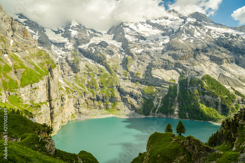 Beautiful Oeschinensee lake in Swiss Alps photo