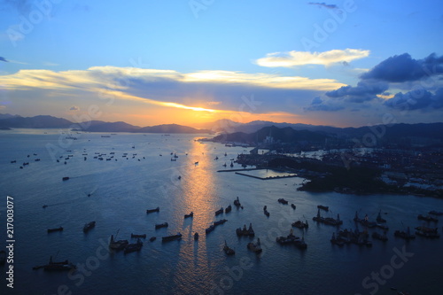 dawn of the busy harbor in hong kong, china
