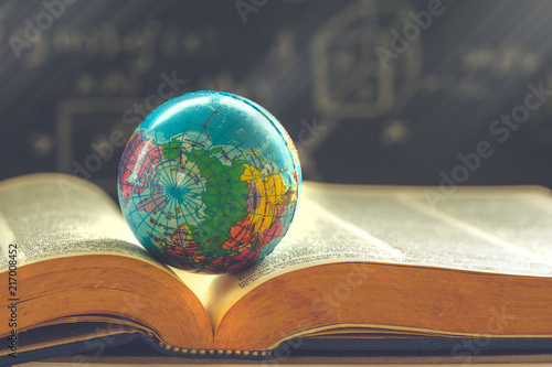 World globe on  book. education school Concept