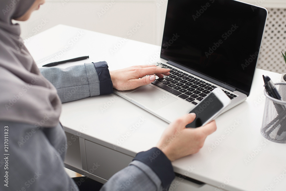 Young saudi business woman working in the office Young saudi business woman working in the office