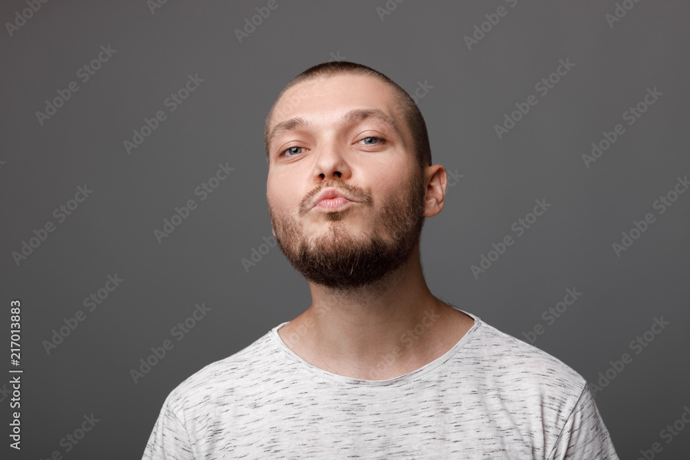 Fototapeta premium the portrait of the young bearded man