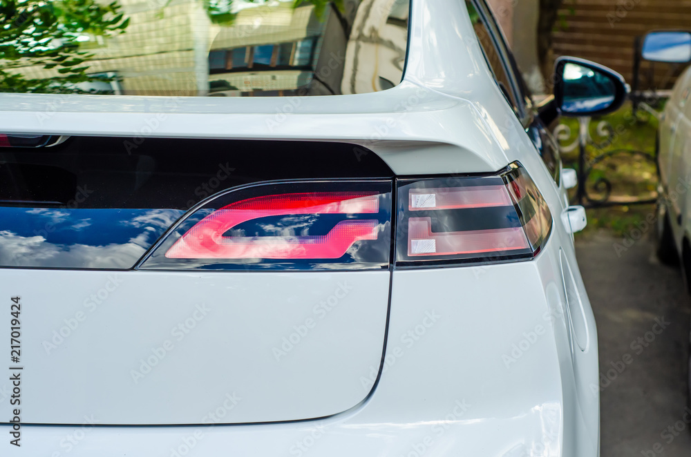 Obraz premium Vehicle tail lights white in the street