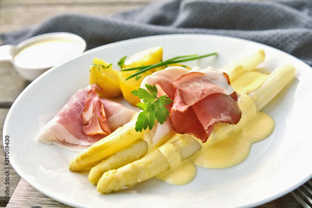 White Asparagus with Black Forest Ham and Hollandaise Sauce. Asparagus European menu. White Asparagus with Black Forest Ham and Hollandaise Sauce. Asparagus European menu.