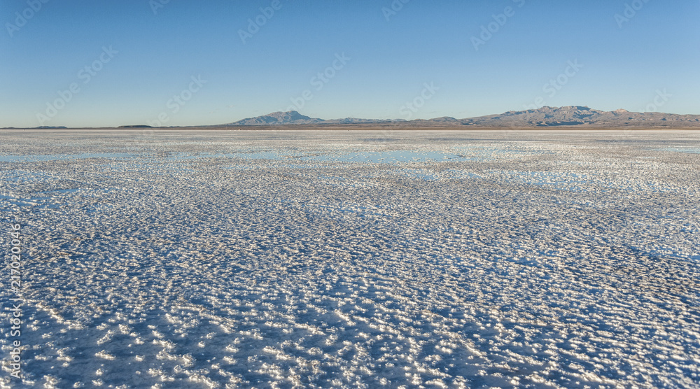 Sunset Salar de Uyuni near Colchani, the largest salt flat in the World UNESCO World Heritage Site - Altiplano, Bolivia Sunset Salar de Uyuni near Colchani, the largest salt flat in the World UNESCO World Heritage Site - Altiplano, Bolivia