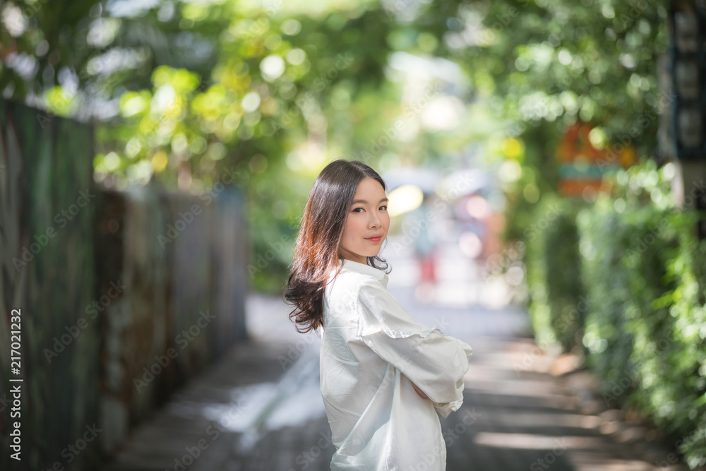 Portrait young woman thinking and looking modern style in outdoor urban background Portrait young woman thinking and looking modern style in outdoor urban background