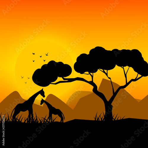 Atardecer en África a contraluz con un árbol típico y un par de siluetas de jirafa y pájaros volando