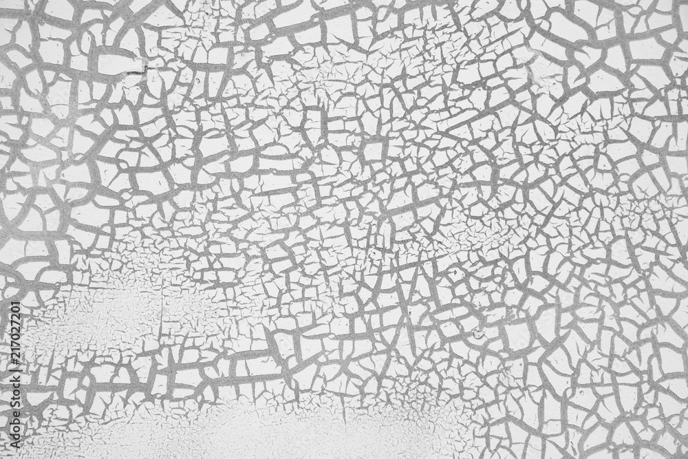 detail of cracked paint on wall. black and white
