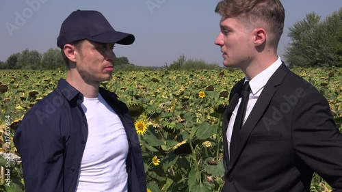 Successful sunflower investment happy businessman farmer team handshake smiling