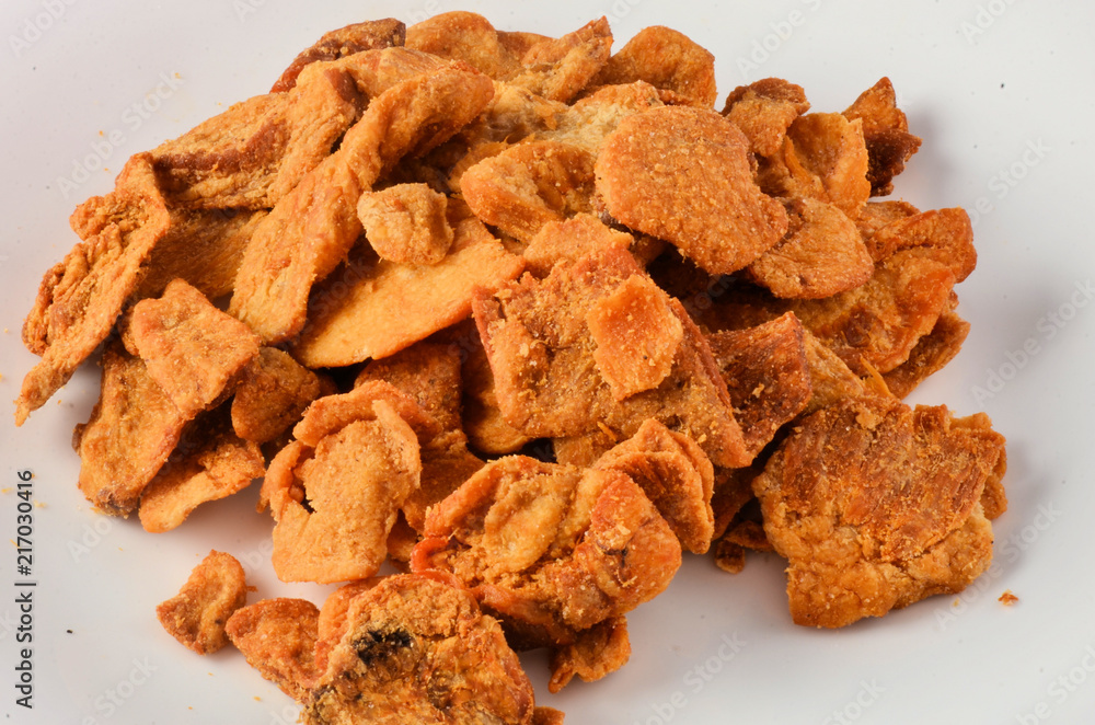 Pork rind favorite food in piedmonte italy, isolated on white. Pork rind favorite food in piedmonte italy, isolated on white.