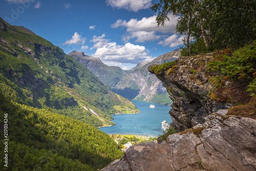 Geiranger - July 30, 2018: Flydalsjuvet viewpoint at the stunning UNESCO Geiranger fjord, Norway