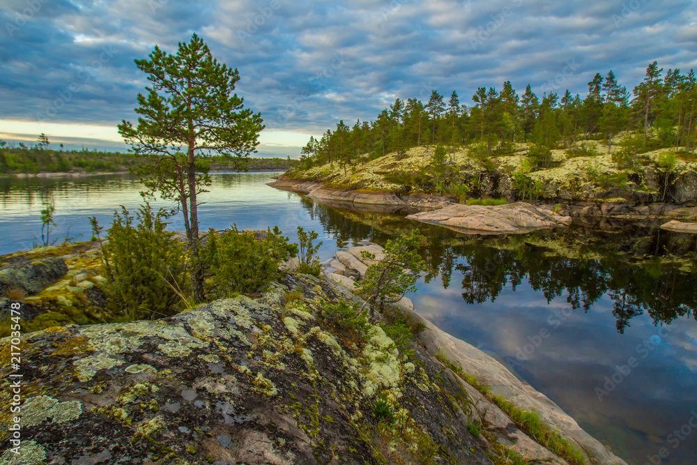 Karelia. Rocky shore. Ladoga lake. The Republic of Karelia. Russia. Islands in the Ladoga. Morning in the Ladoga.