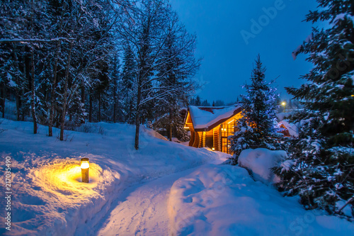 Snow-covered road to the ho...