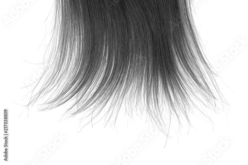 Tips of black hair on white background