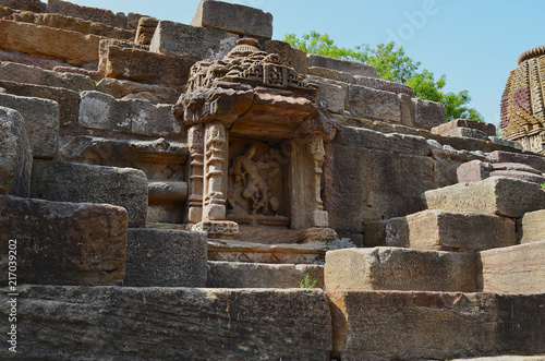 Ancient ruined hindu temple made out of stones and rocks