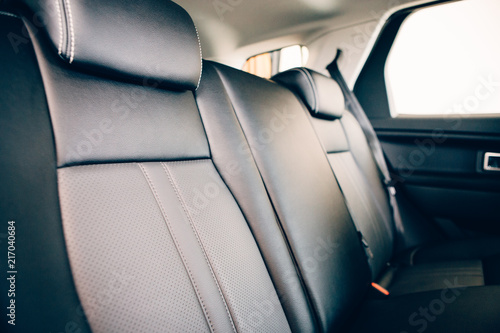 Car seat in leather upholstery © click_and_photo